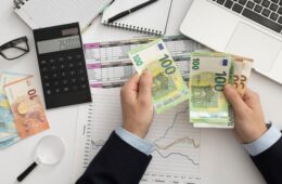flat-lay-business-man-checking-finance-manners-min