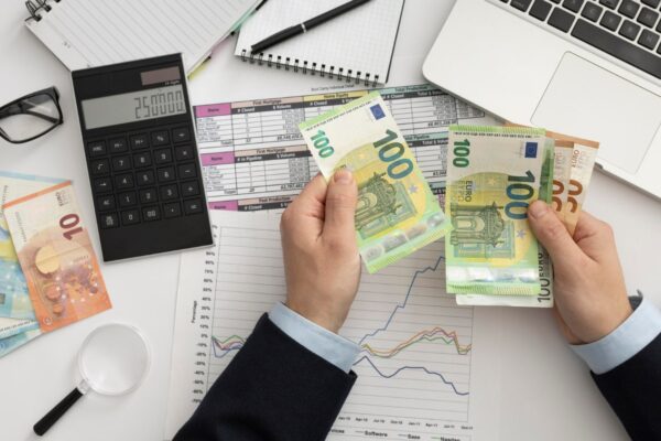 flat-lay-business-man-checking-finance-manners-min flat-lay-business-man-checking-finance-manners-min